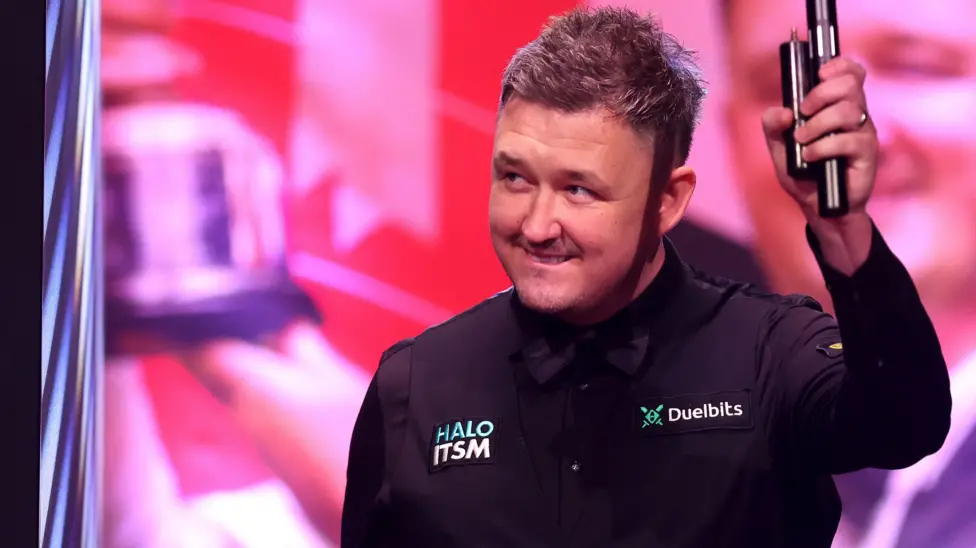 Wilson leads in first match of world title defence